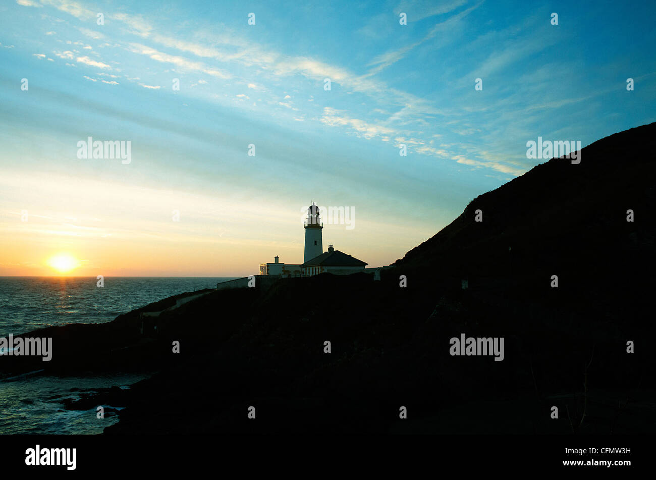 Lighthouse at Douglas Head sunrise Stock Photo