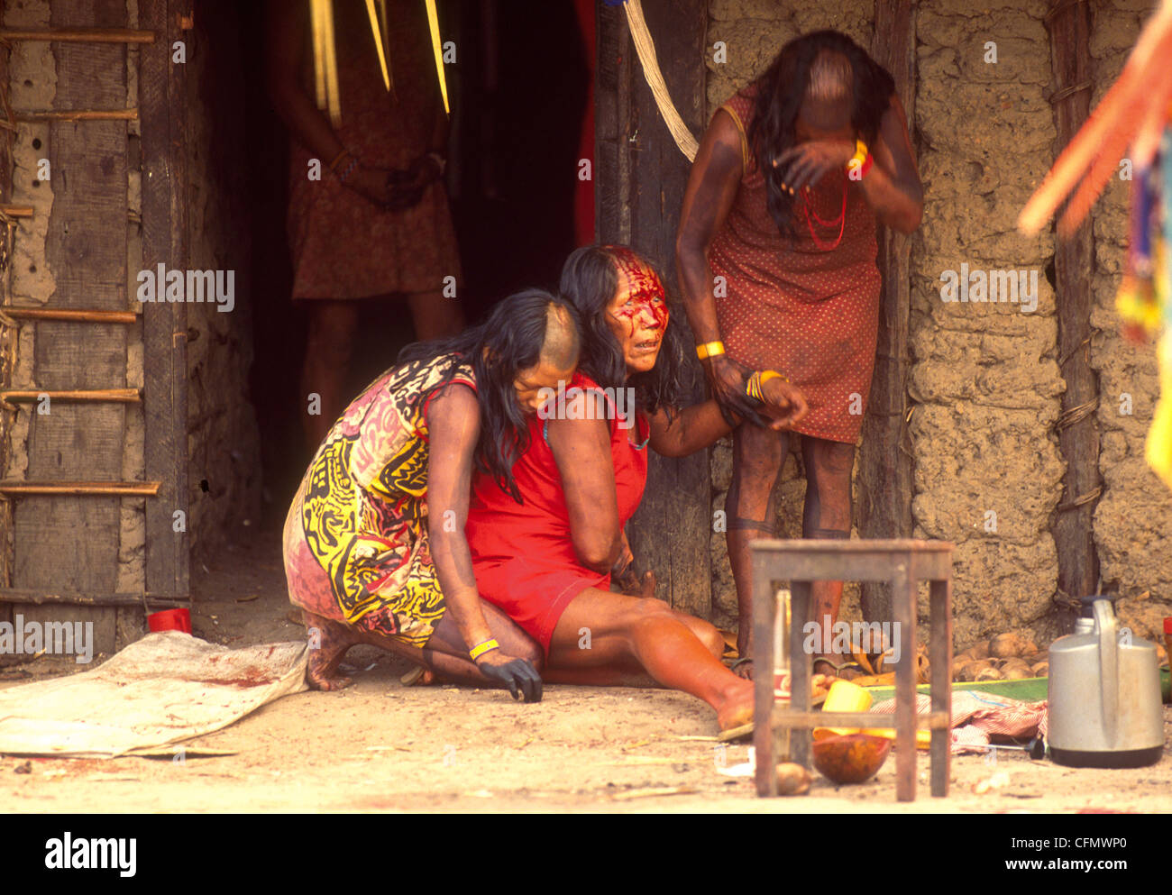 Rite of passage when the Xikrin Indigenous People achieve the spiritual majority Woman hit her own head with a machete Amazon Stock Photo