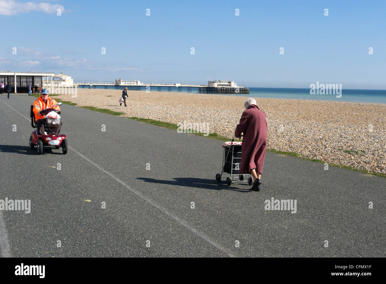 united kingdom west sussex worthing an elderly man on a shoprider