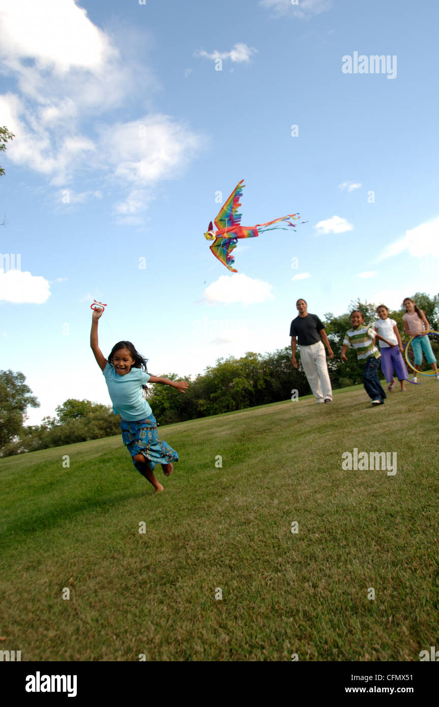 Family Flying Kite Stock Photo