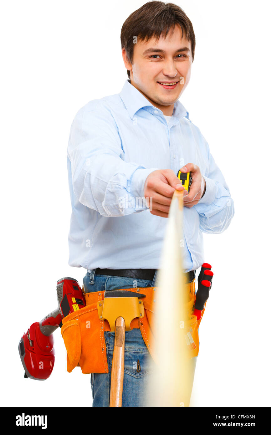 Construction worker holding ruler that going into the distance Stock ...