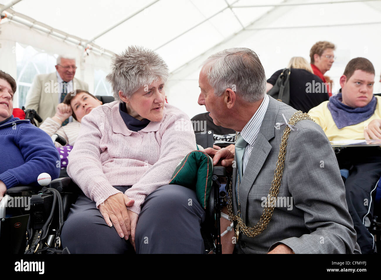 Great Yarmouth Mayor, Barry Coleman, chats with Centre 81 member during their Annual General Meeting Stock Photo