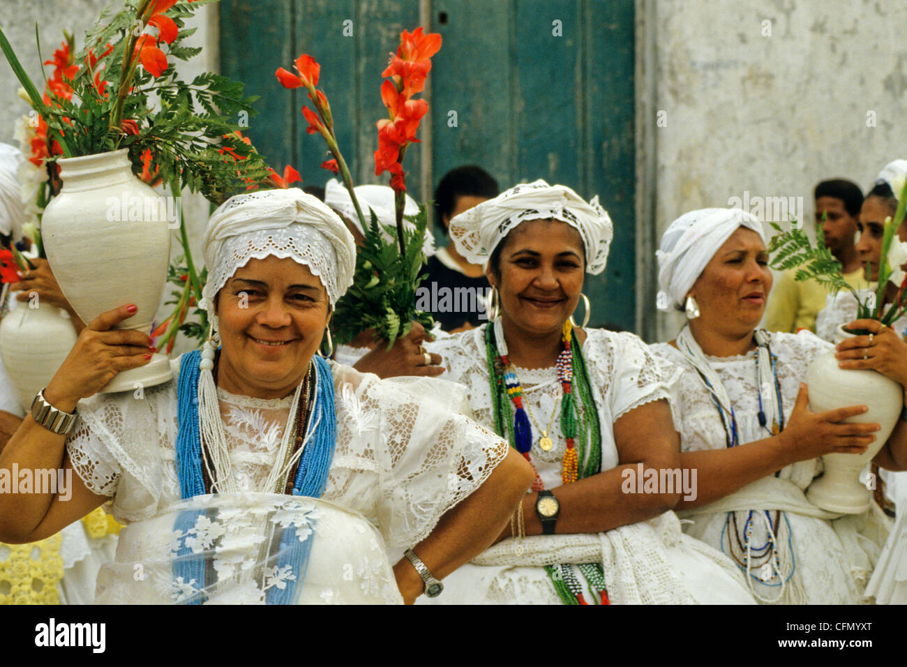 Bahian woman, dressed in traditional attire, get ready for a