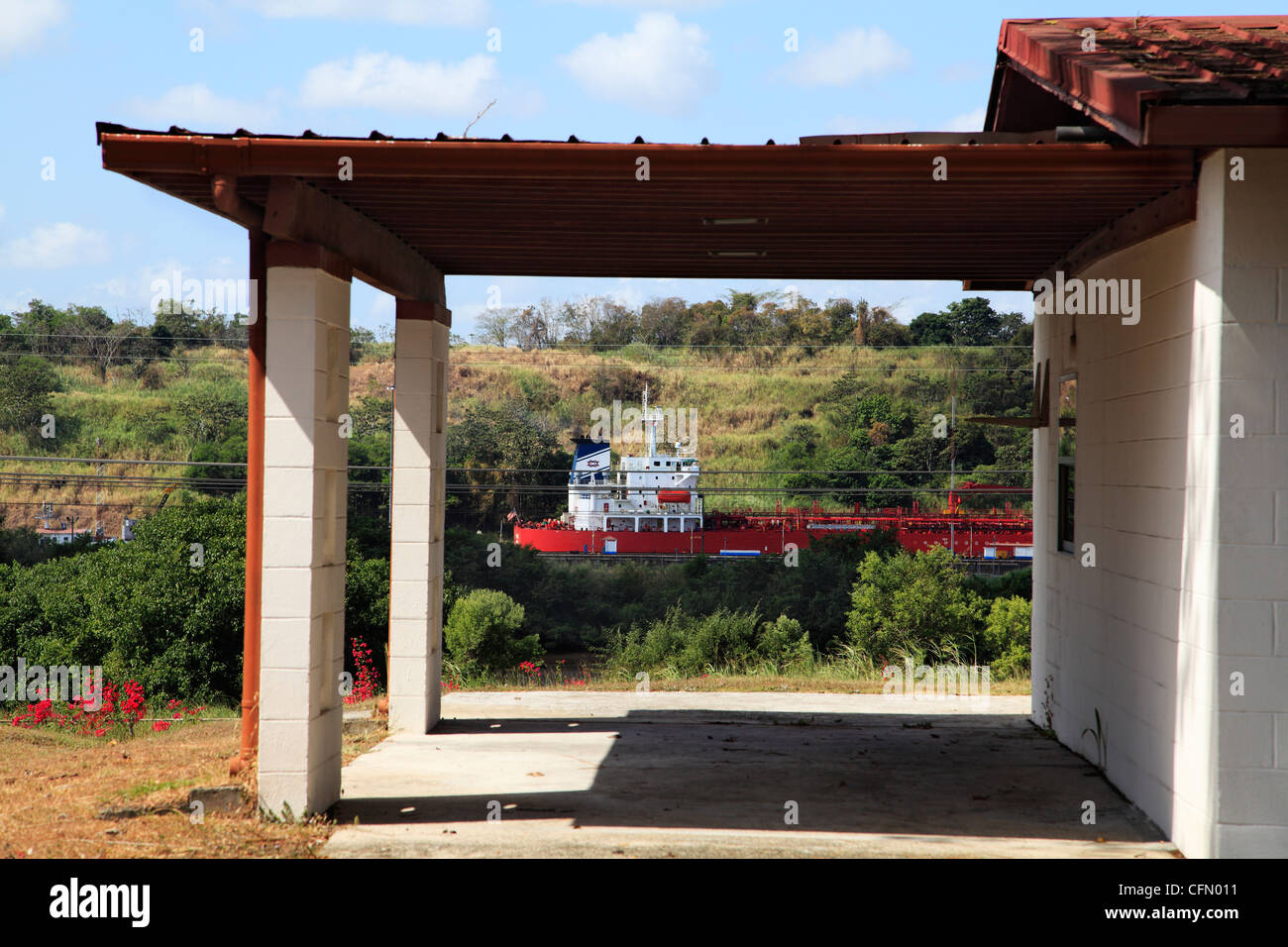 Ship On The Panama Canal Framed In The Car Port Of A Bungalow From The Former Fort Clayton