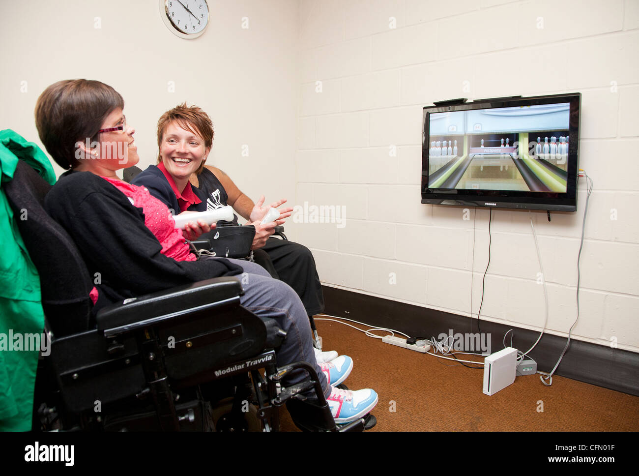 Tesco donate new TV to disabled charity Centre 81 Stock Photo