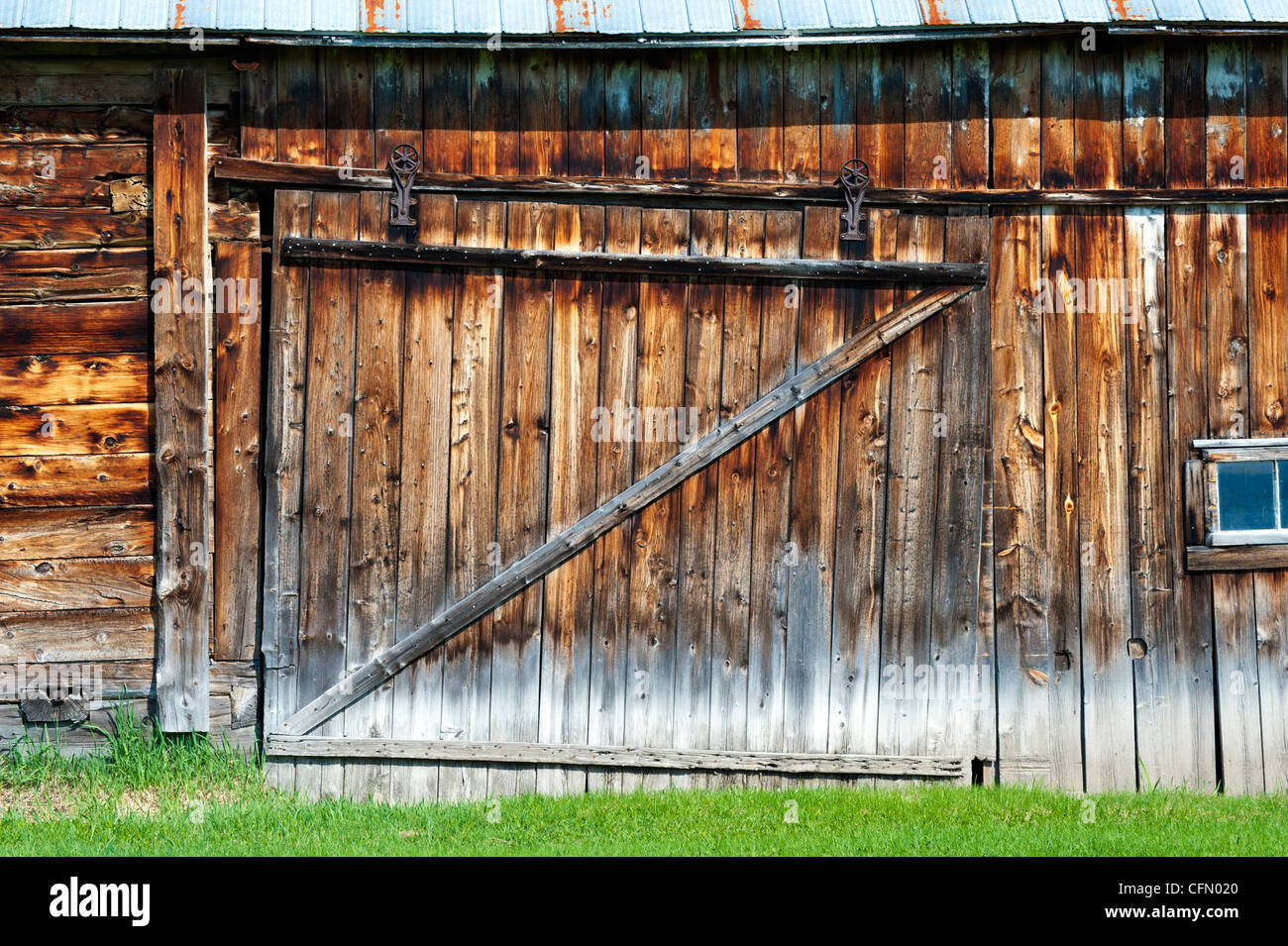 Sliding Door Of An Old Weathered Wooden Barn Port Au Persil Stock