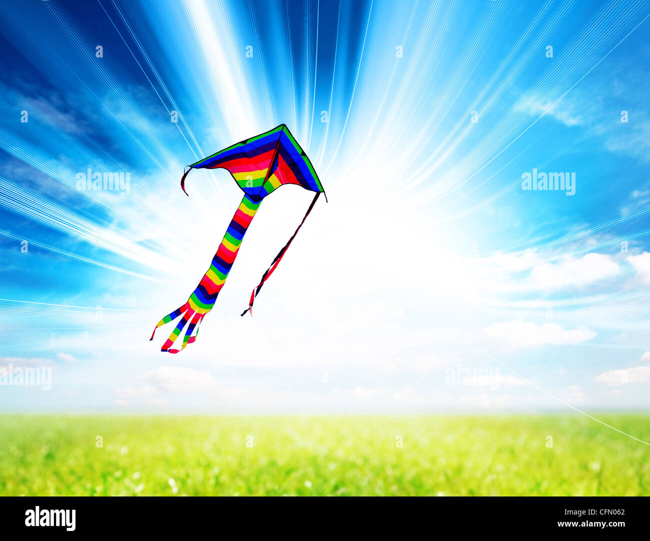 colourful summer kite flying in sky Stock Photo - Alamy