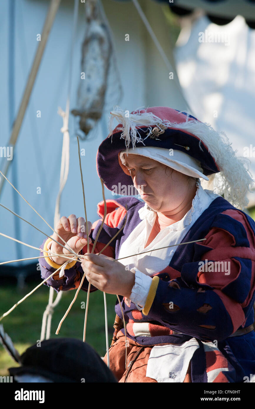 16th century basket weaving at living history fayre Stock Photo Alamy