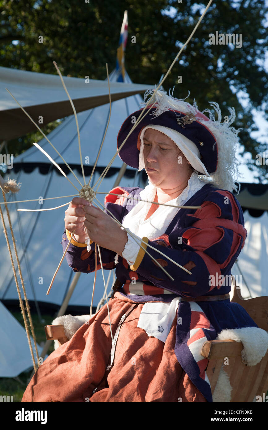 16th century basket weaving at living history fayre Stock Photo Alamy