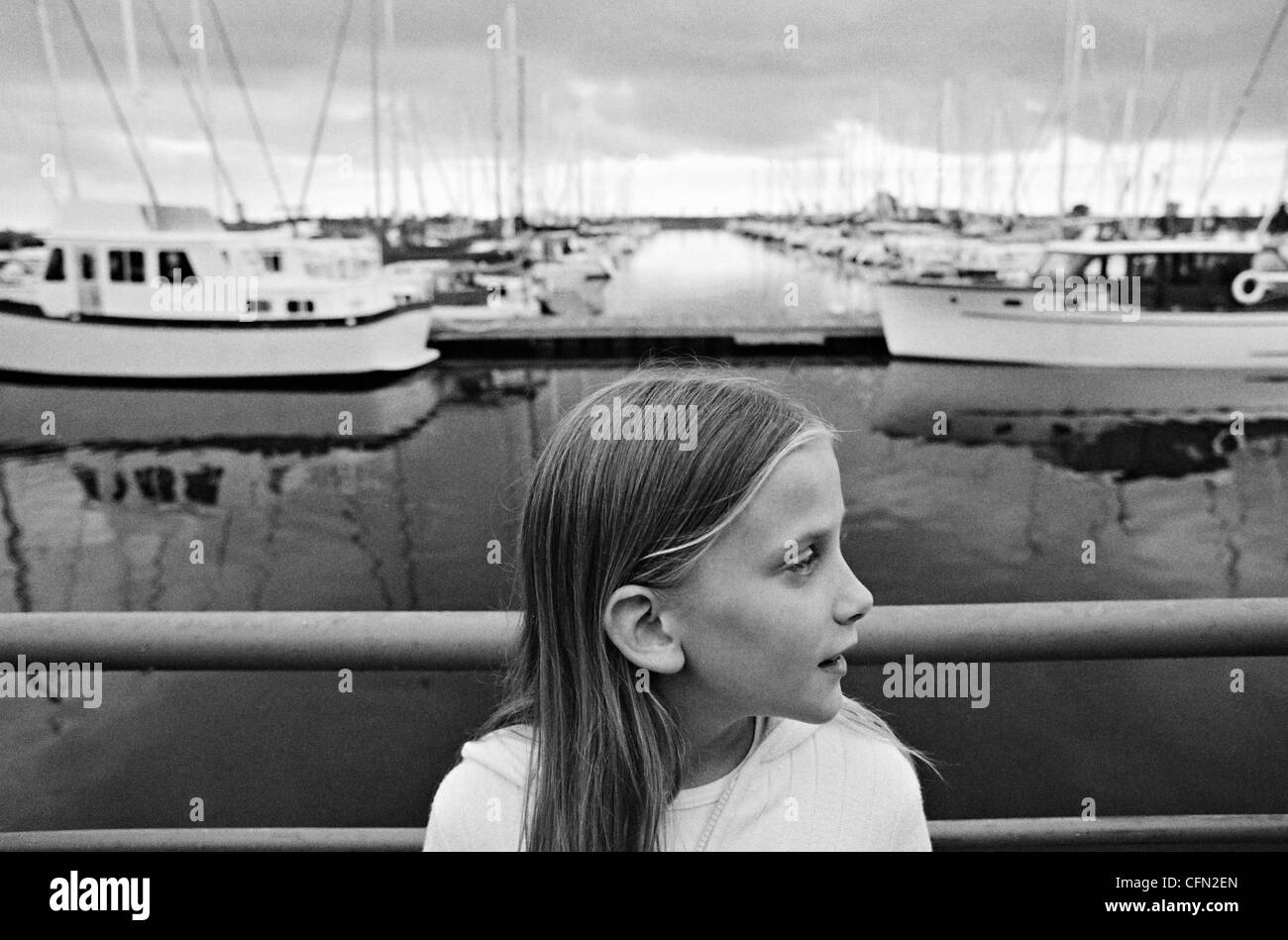 Girl on a Dock Stock Photo