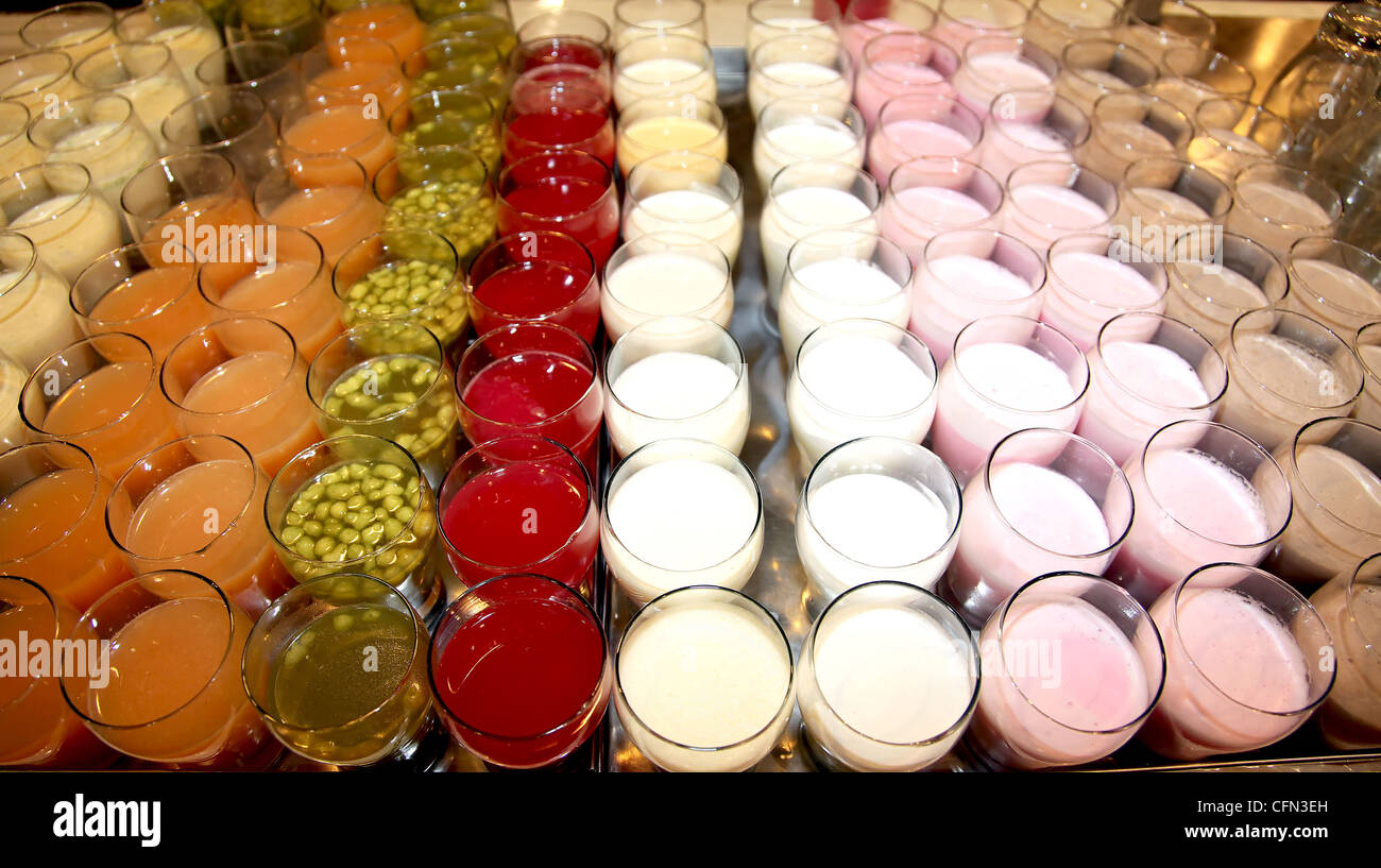 Fresh fruit juice and cold drink serving in the party Stock Photo - Alamy