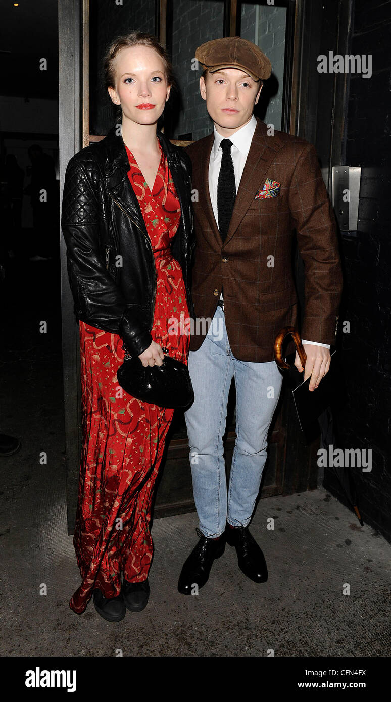 Freddie Fox and his girlfriend arriving at the InStyle Best of British Talent Party at Shoreditch House. London, England - 26.01.12 Stock Photo