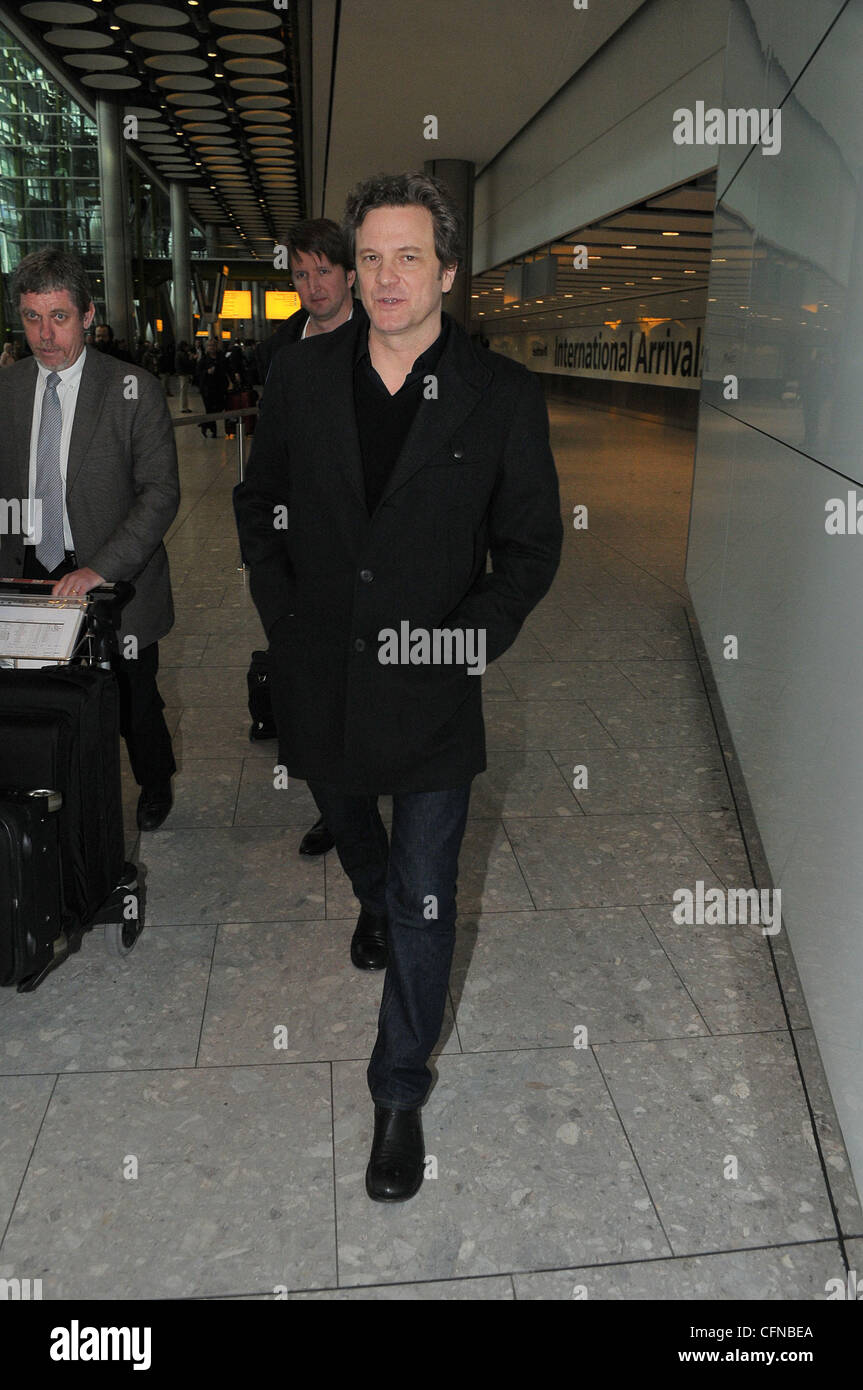 Colin Firth arriving at Heathrow airport London, England - 17.02.11 Stock Photo