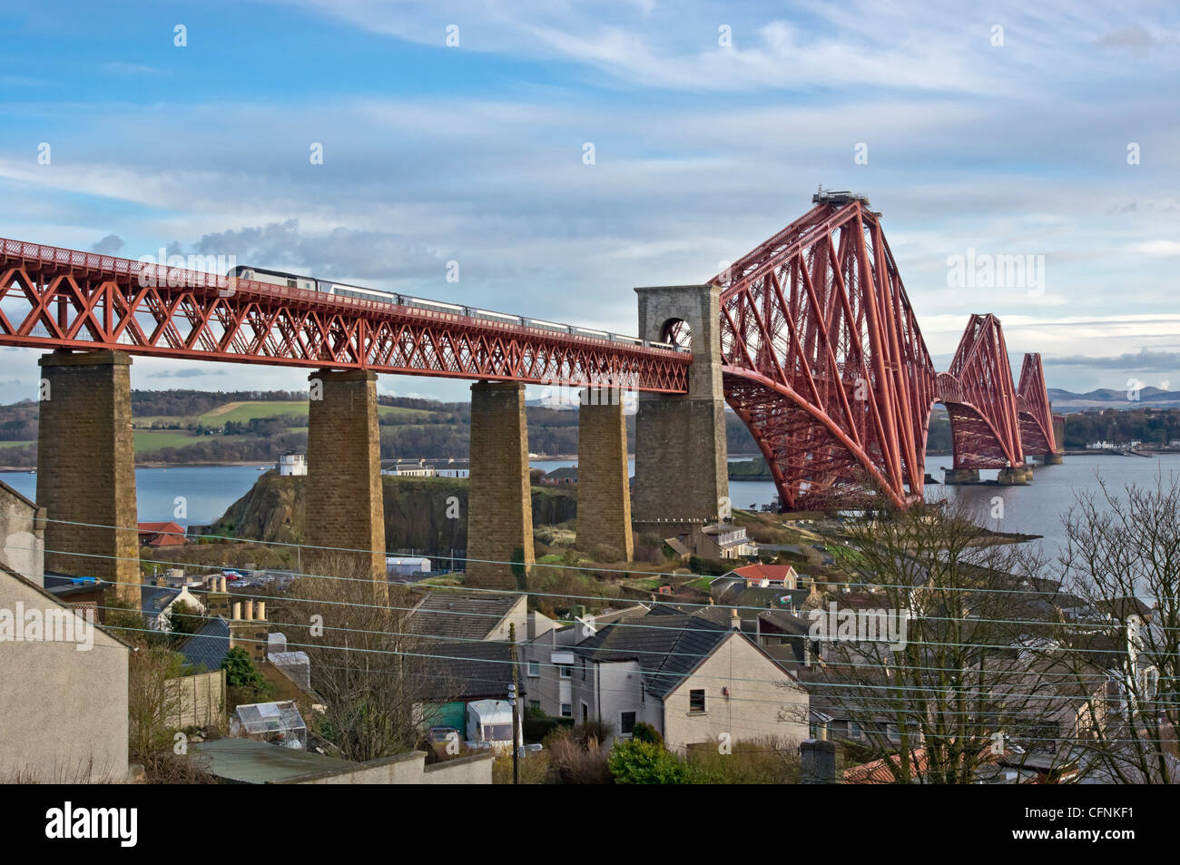 Newly painted Forth Rail Bridge linking North Queensferry with South Queensferry  as seen from the North Queensferry side. Stock Photo