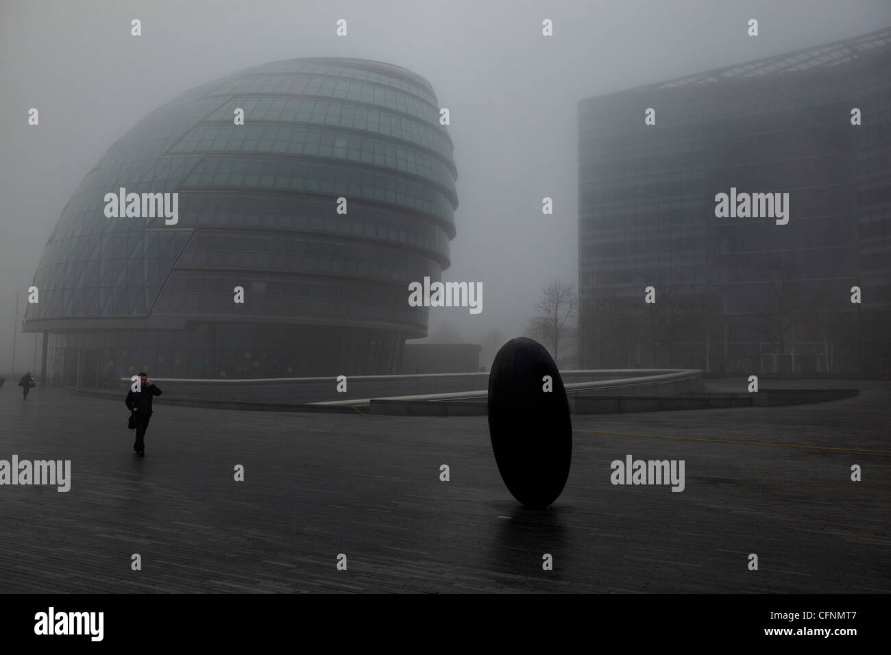 London City Hall in the morning fog in the More London area Stock Photo