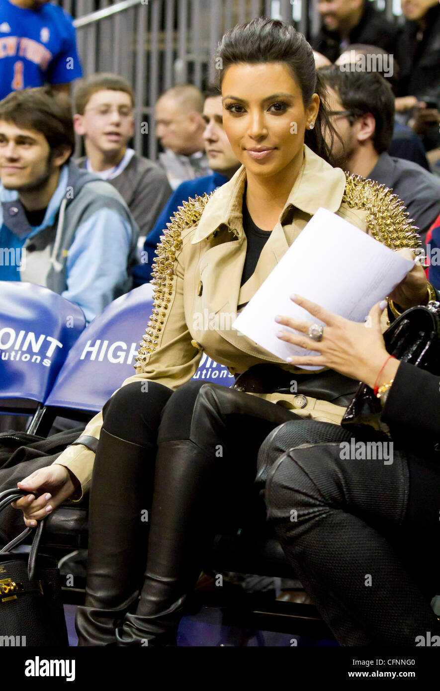Kim Kardashian sits courtside during the NBA game between the New York  Knicks and the New Jersey Nets at the Prudential Center in Newark New Jersey,  USA - 12.02.11 Stock Photo - Alamy