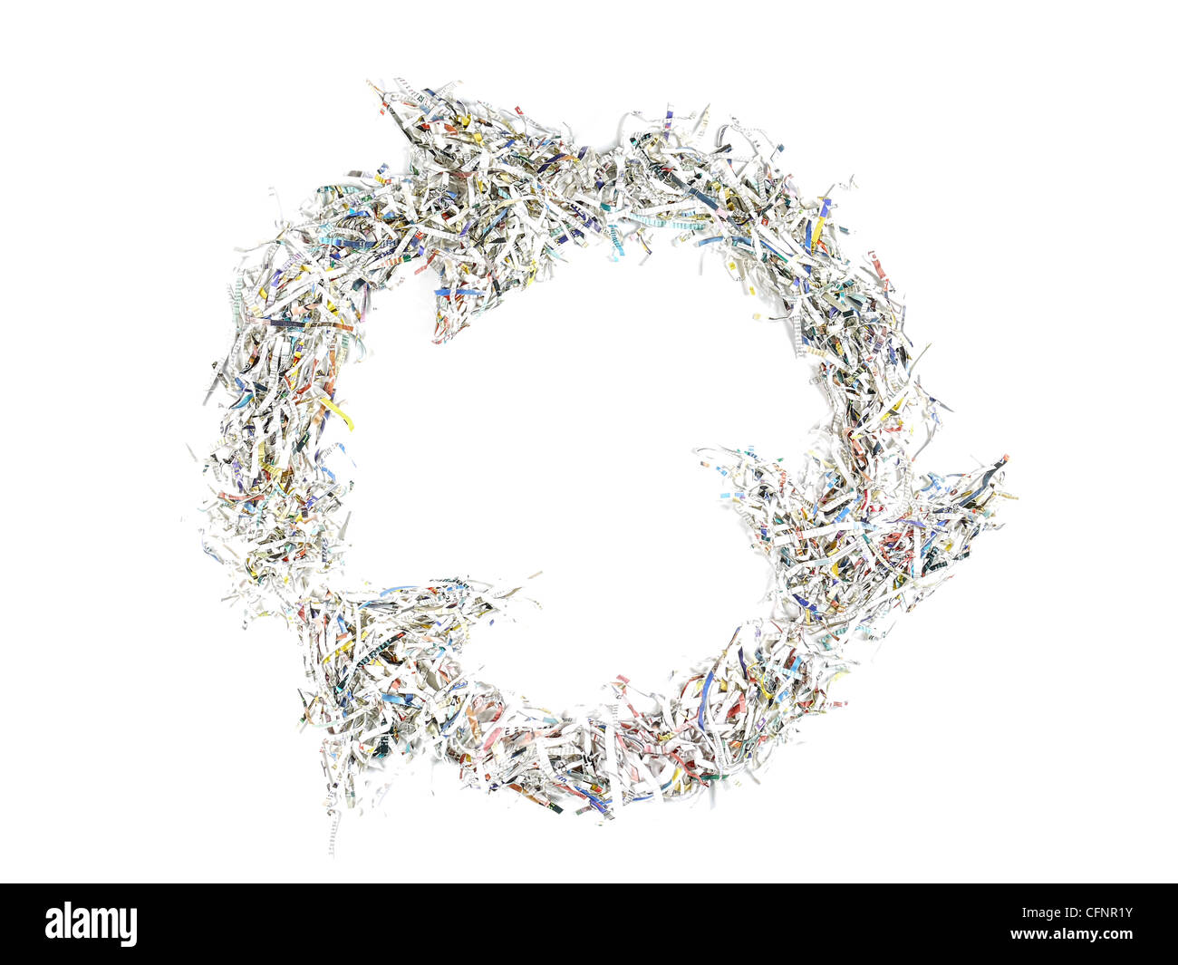 Paper cuttings arranged in form of three arrow recycle symbol - over white background Stock Photo