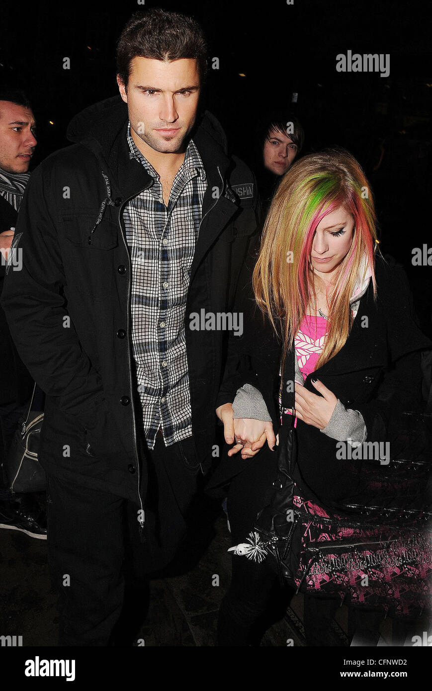 Avril Lavigne and her boyfriend Brody Jenner arriving back at their