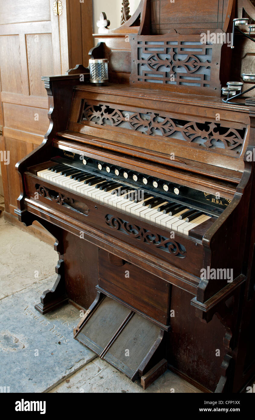 A harmonium in All Saints Church, Billesley, Warwickshire, England, UK Stock Photo