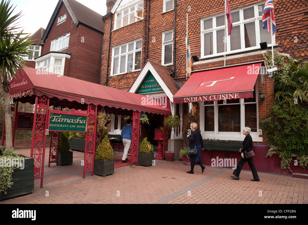 People entering the Tamasha Indian restaurant, Bromley Kent UK Stock