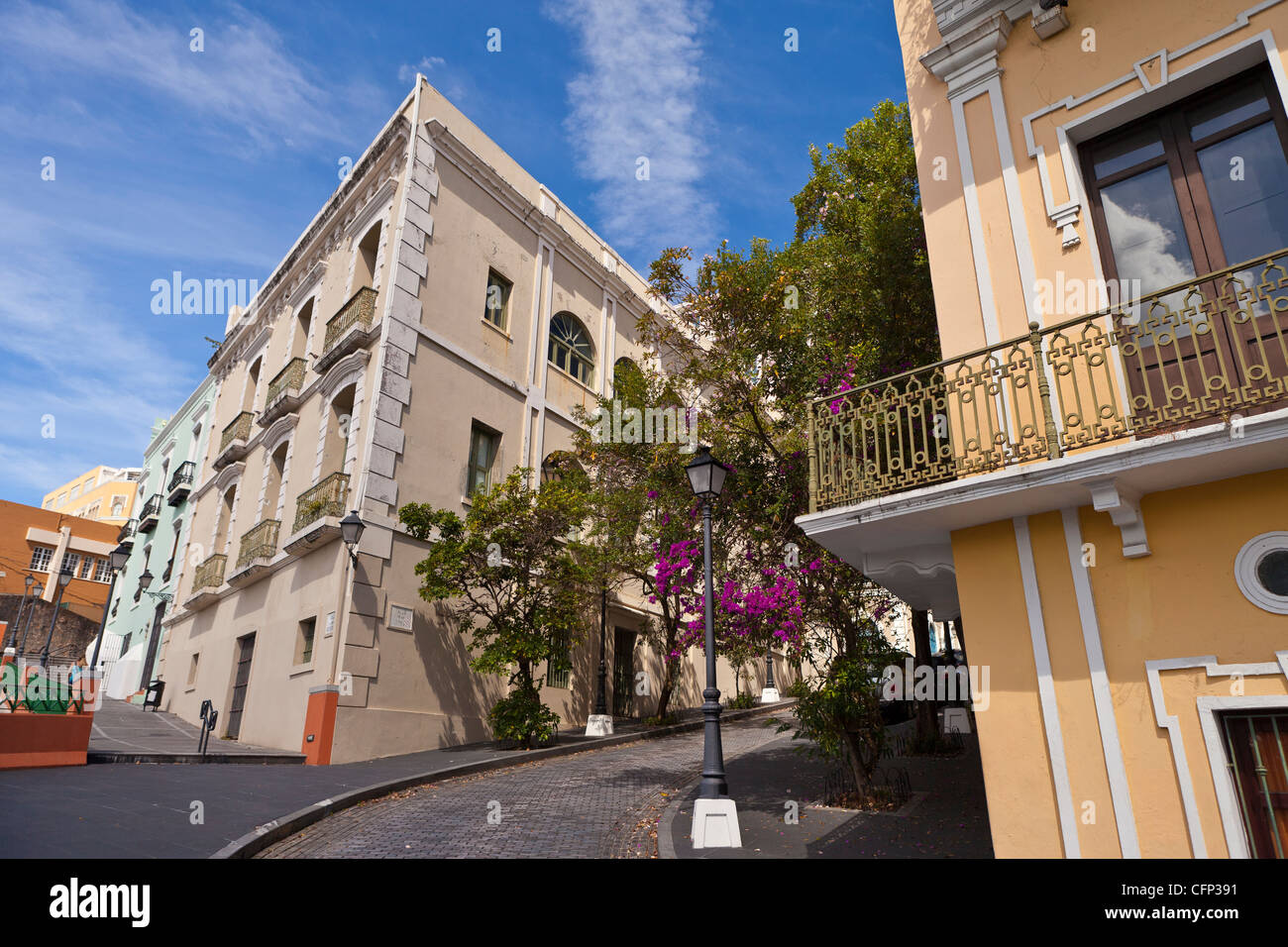 OLD SAN JUAN, PUERTO RICO - Historic buildings and cobblestone street. Stock Photo