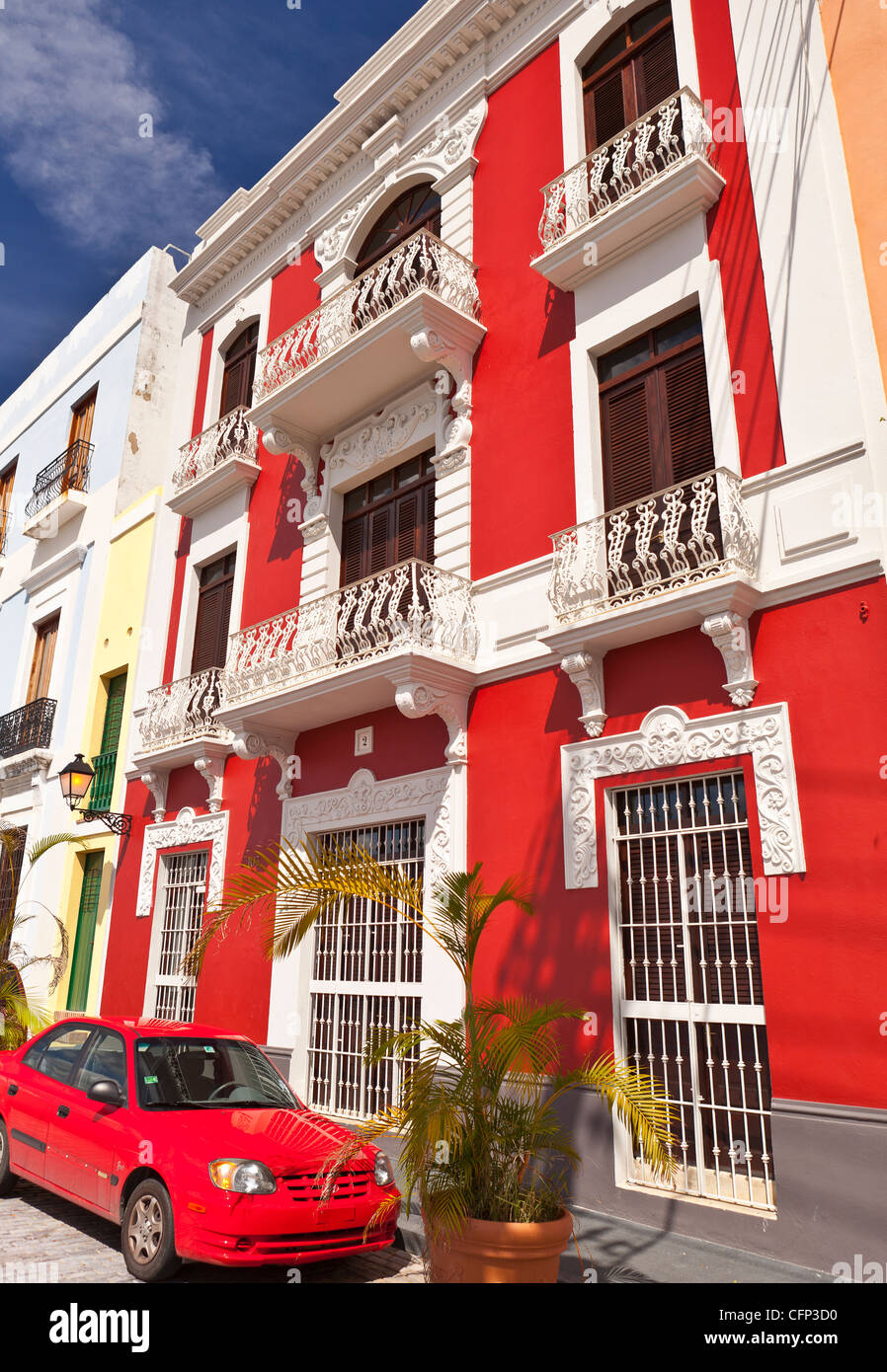 OLD SAN JUAN, PUERTO RICO Historic red building with balconies on Calle de Tetuan Stock Photo