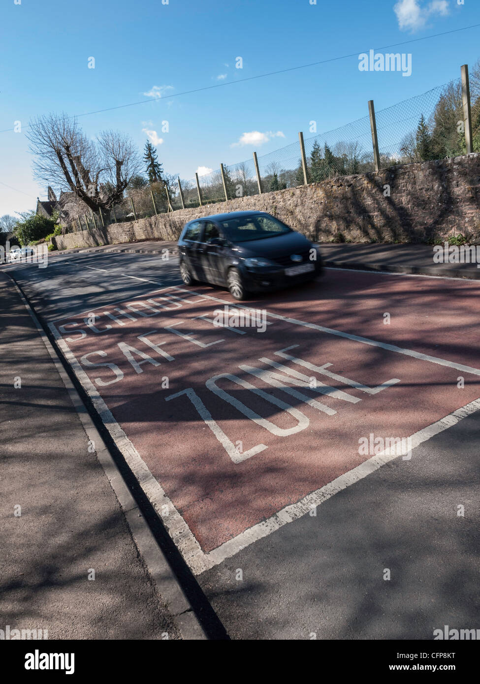 School safety zone road markings near primary school in Gloucestershire