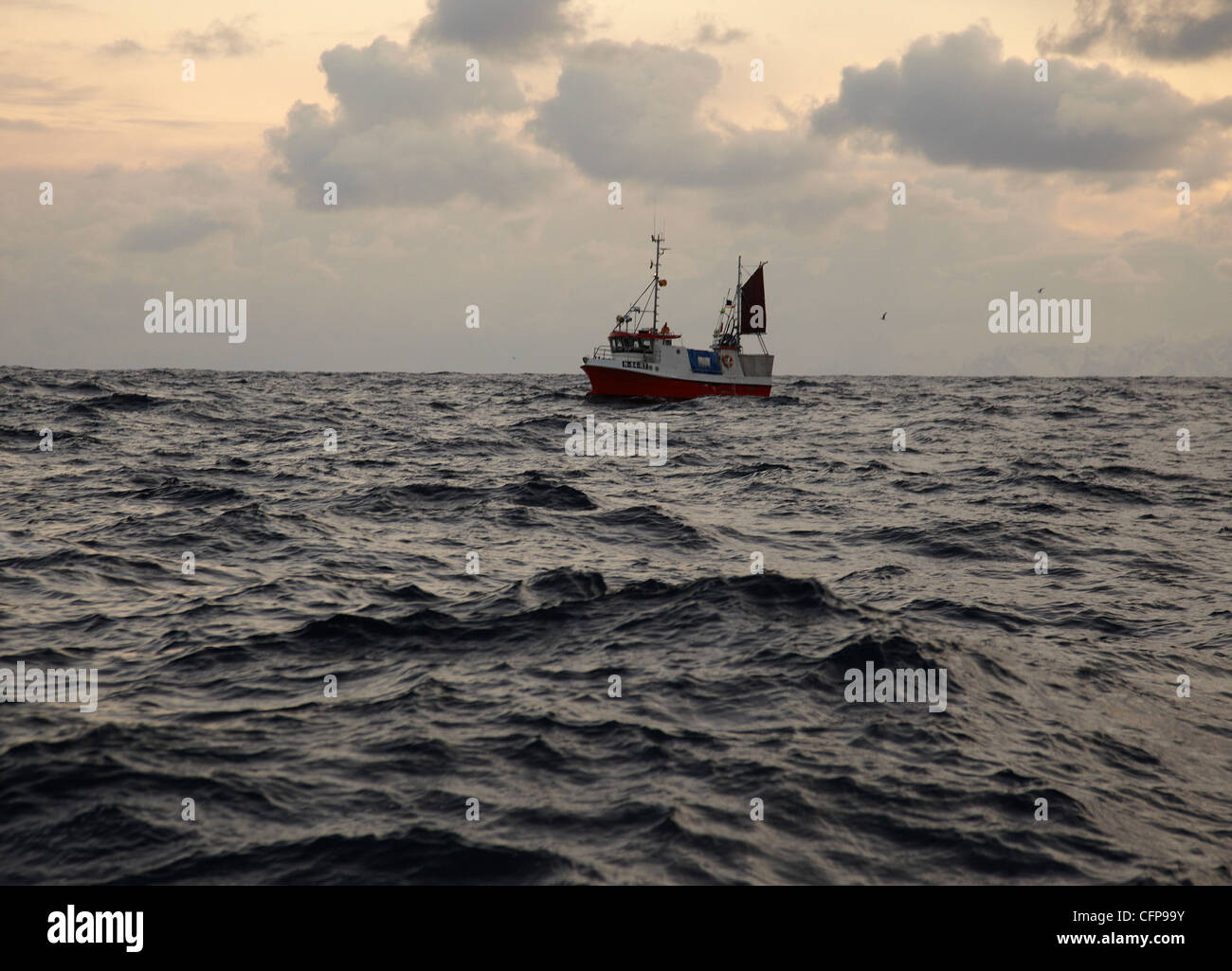 A fishing boat in the field in the Atlantic ocean Stock Photo