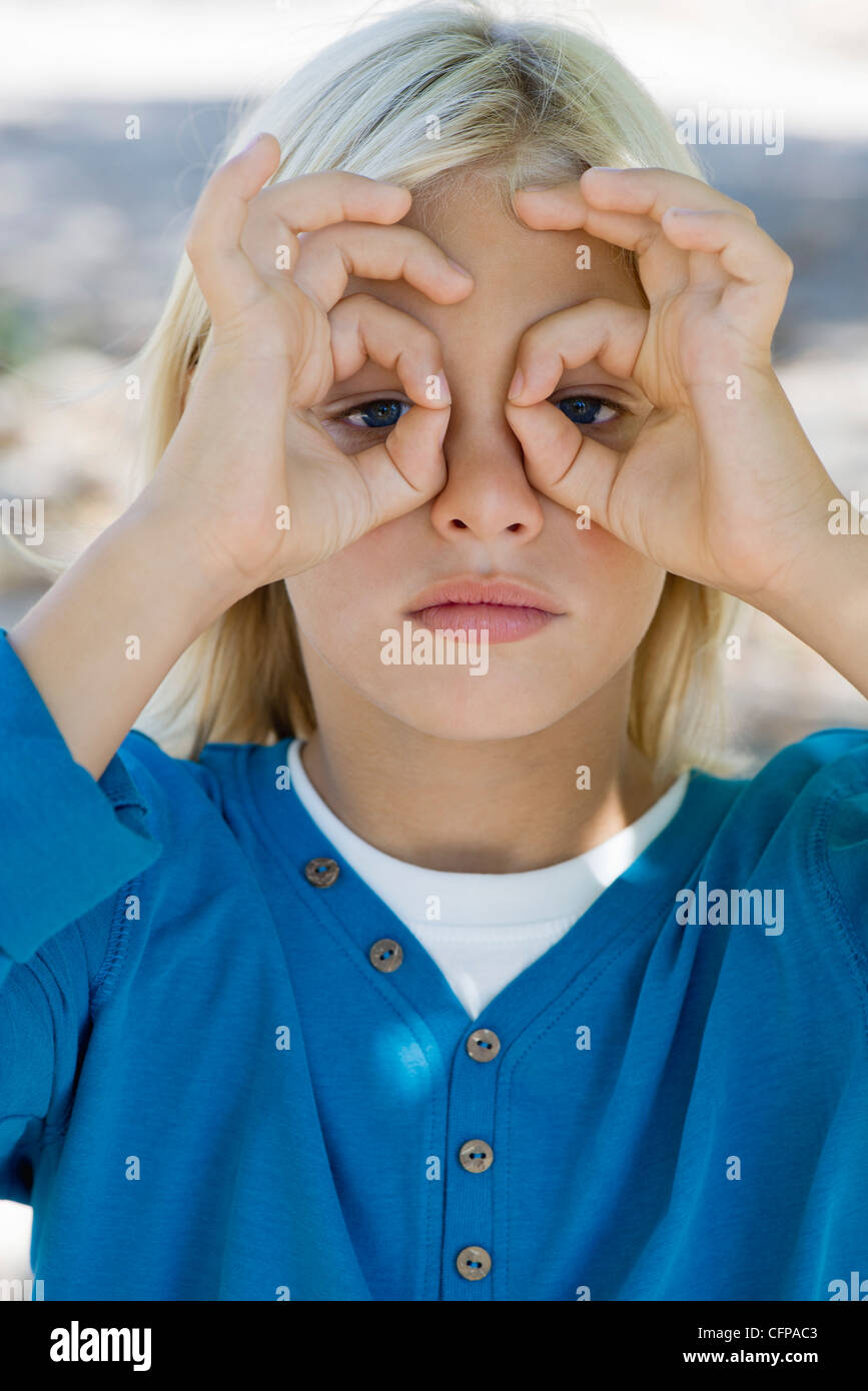 Fingers around eyes hires stock photography and images Alamy