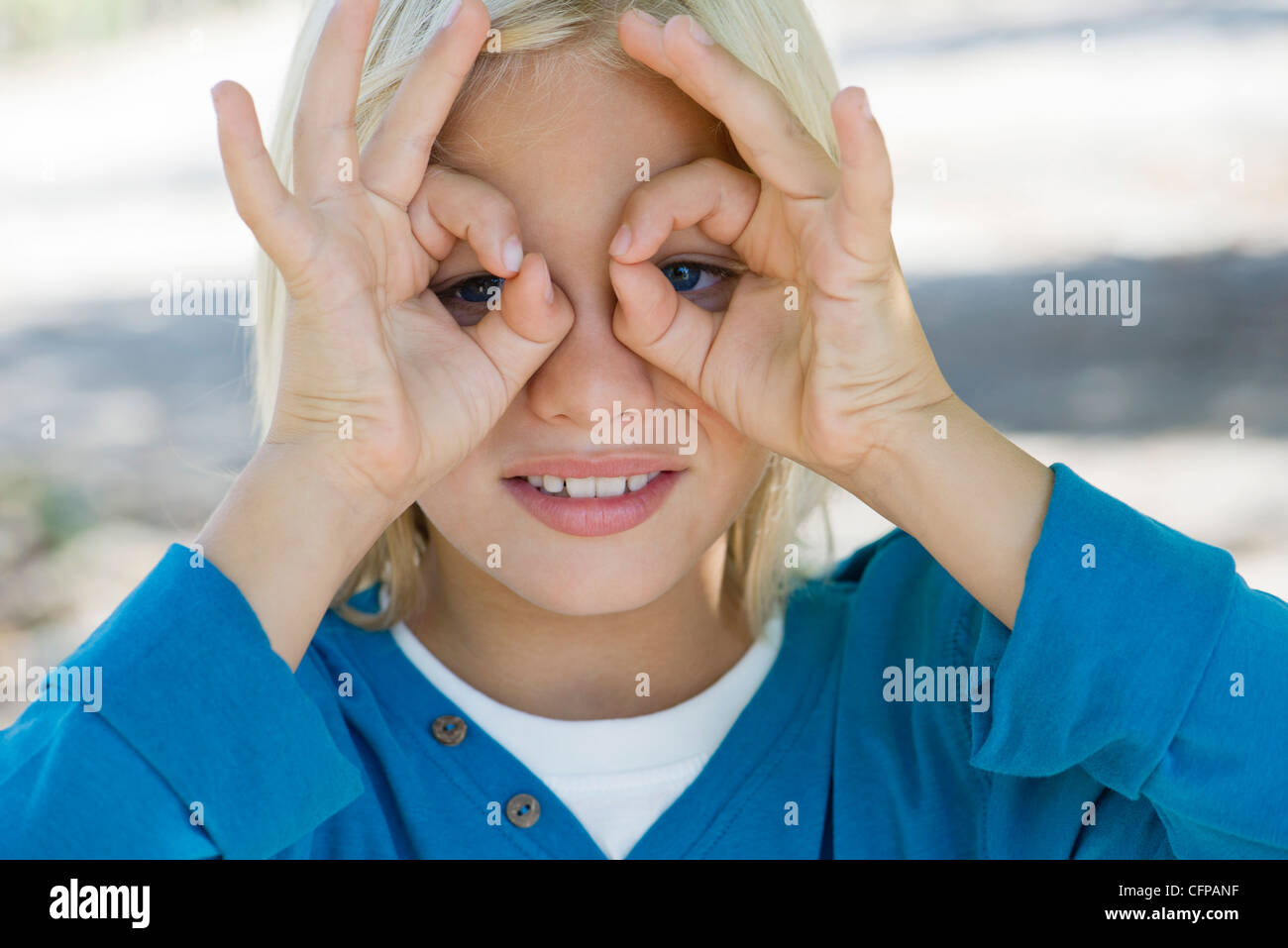 Fingers around eyes hires stock photography and images Alamy