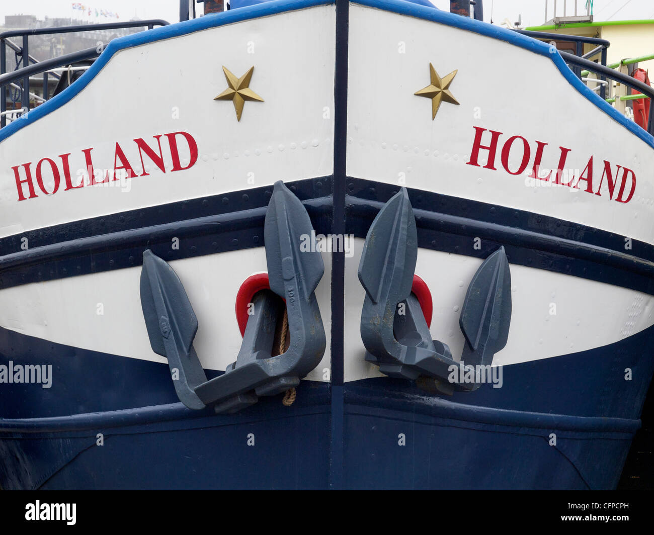 Boat bow with two anchors ship is named Holland. Amsterdam the Netherlands Stock Photo