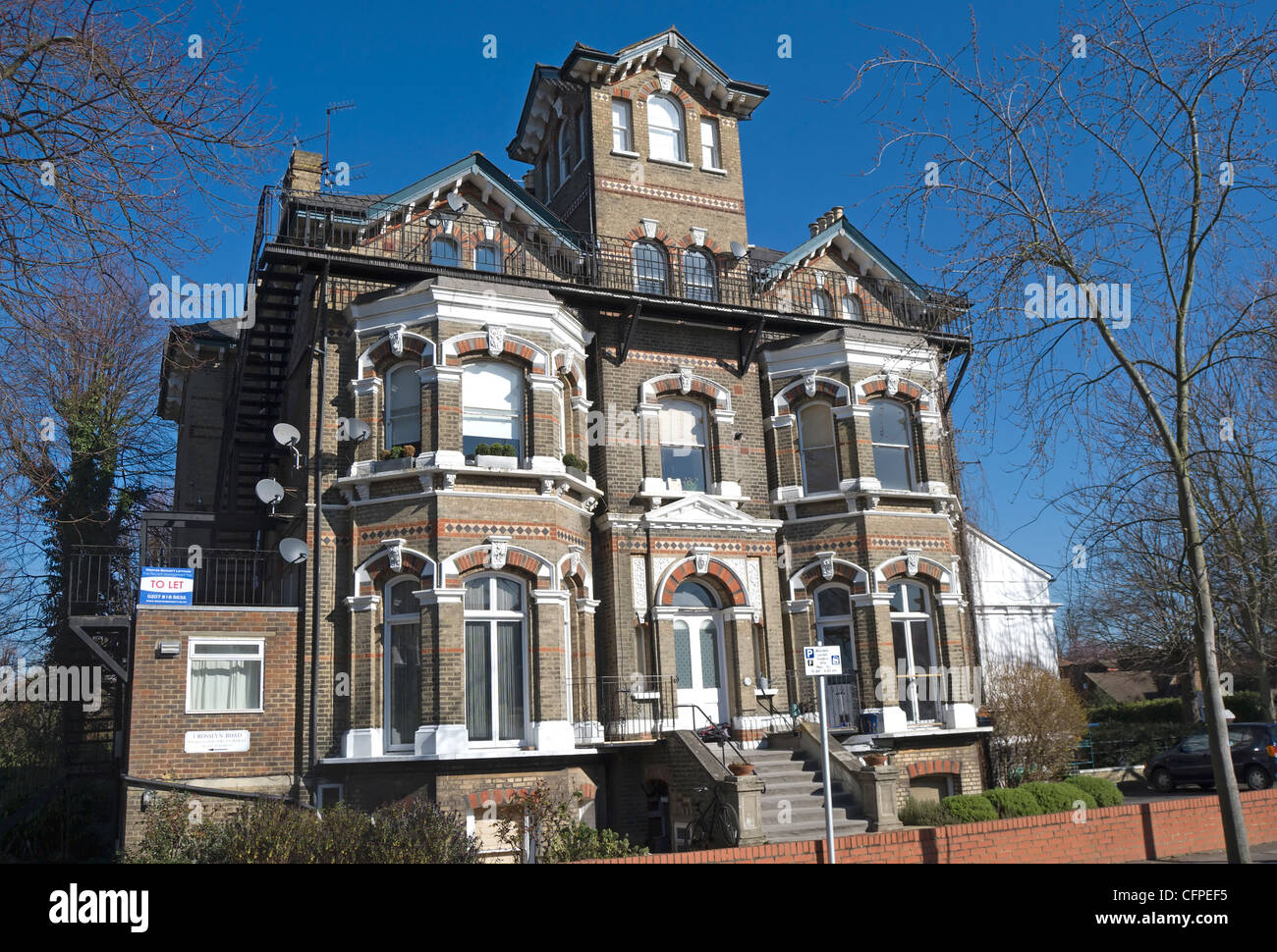 carisbrooke house, a victorian gothic style house in east twickenham, middlesex, england, with modern ground floor extension to left Stock Photo