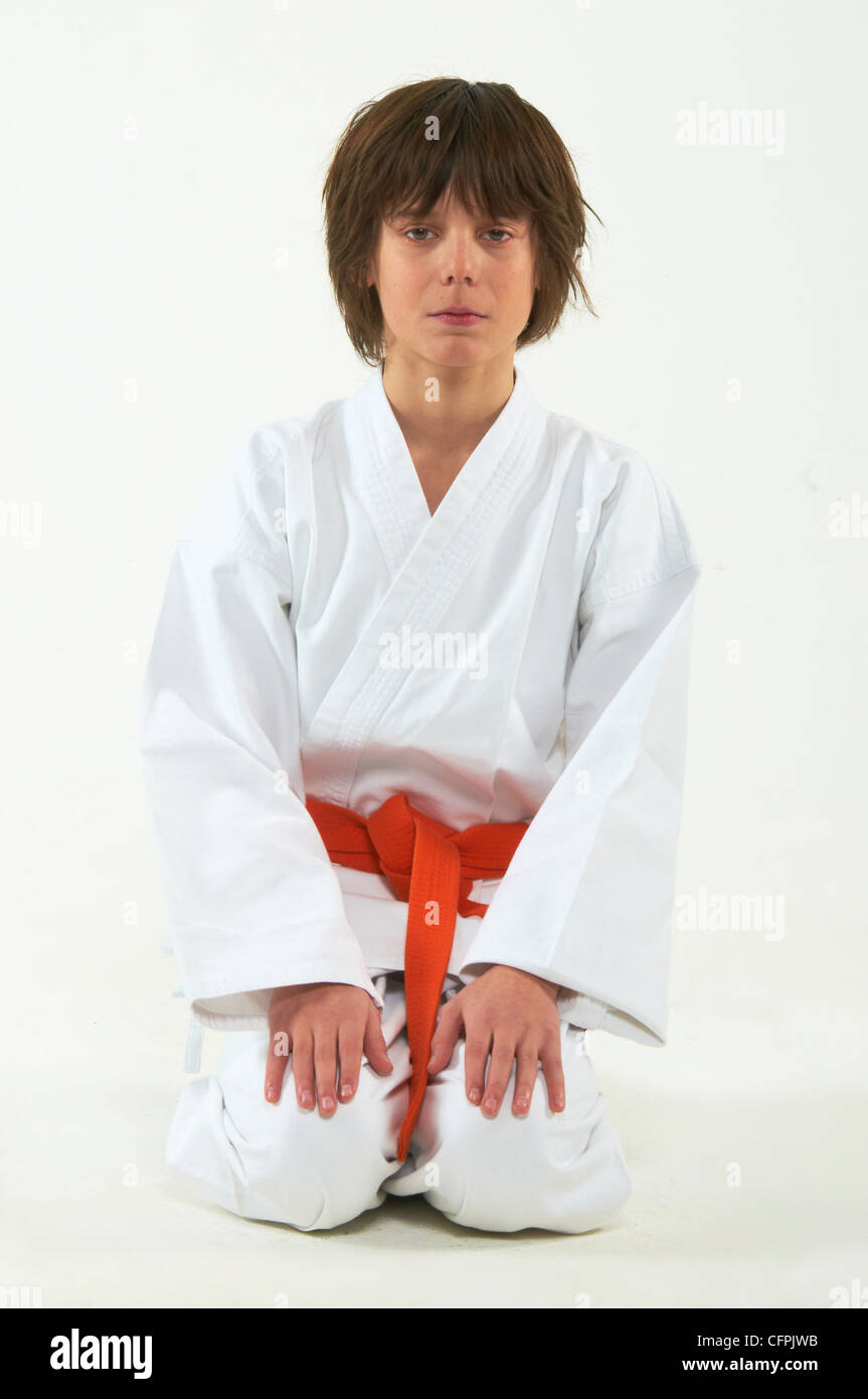 boy practicing karate on white background Stock Photo Alamy