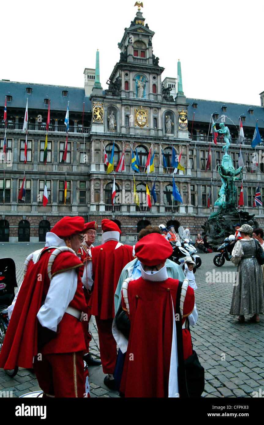 Belgium, Flanders, Antwerp, Grote Markt Square,  Mans in Historical Costume an Brabo Fountain Stock Photo