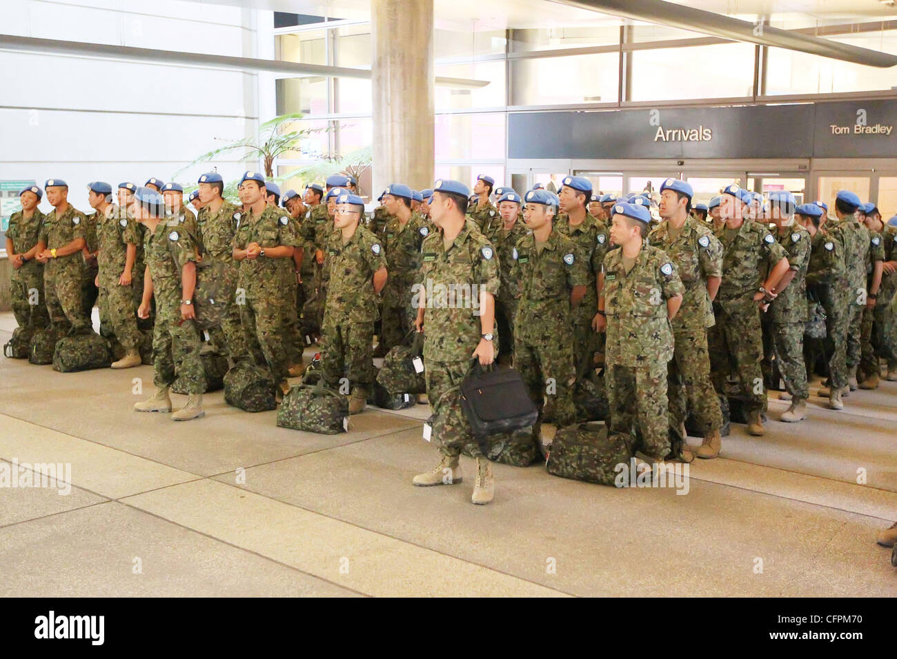 A UN peacekeeping force from Japan arriving at LAX after a 6 month deployment in Haiti Los Angeles, USA - 09.02.11 Stock Photo
