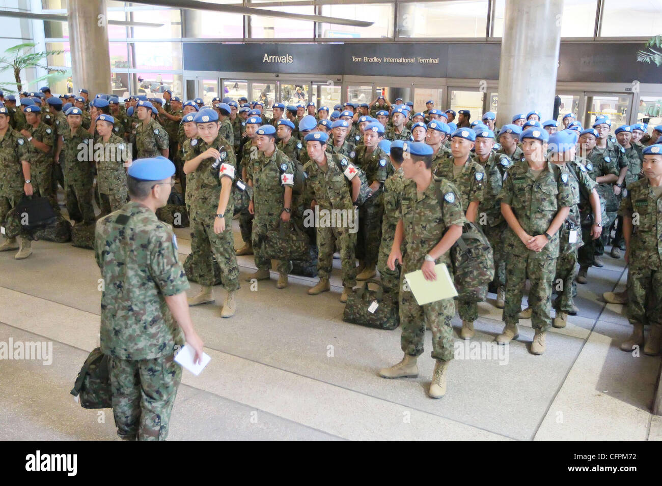 A UN peacekeeping force from Japan arriving at LAX after a 6 month deployment in Haiti Los Angeles, USA - 09.02.11 Stock Photo