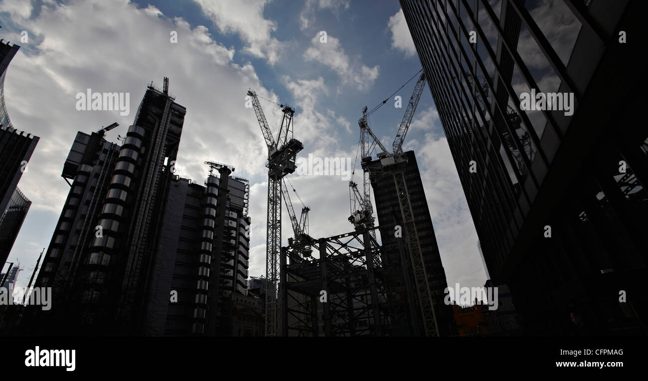 Office blocks and construction sites dominate the London skyline on a sunny day. Stock Photo