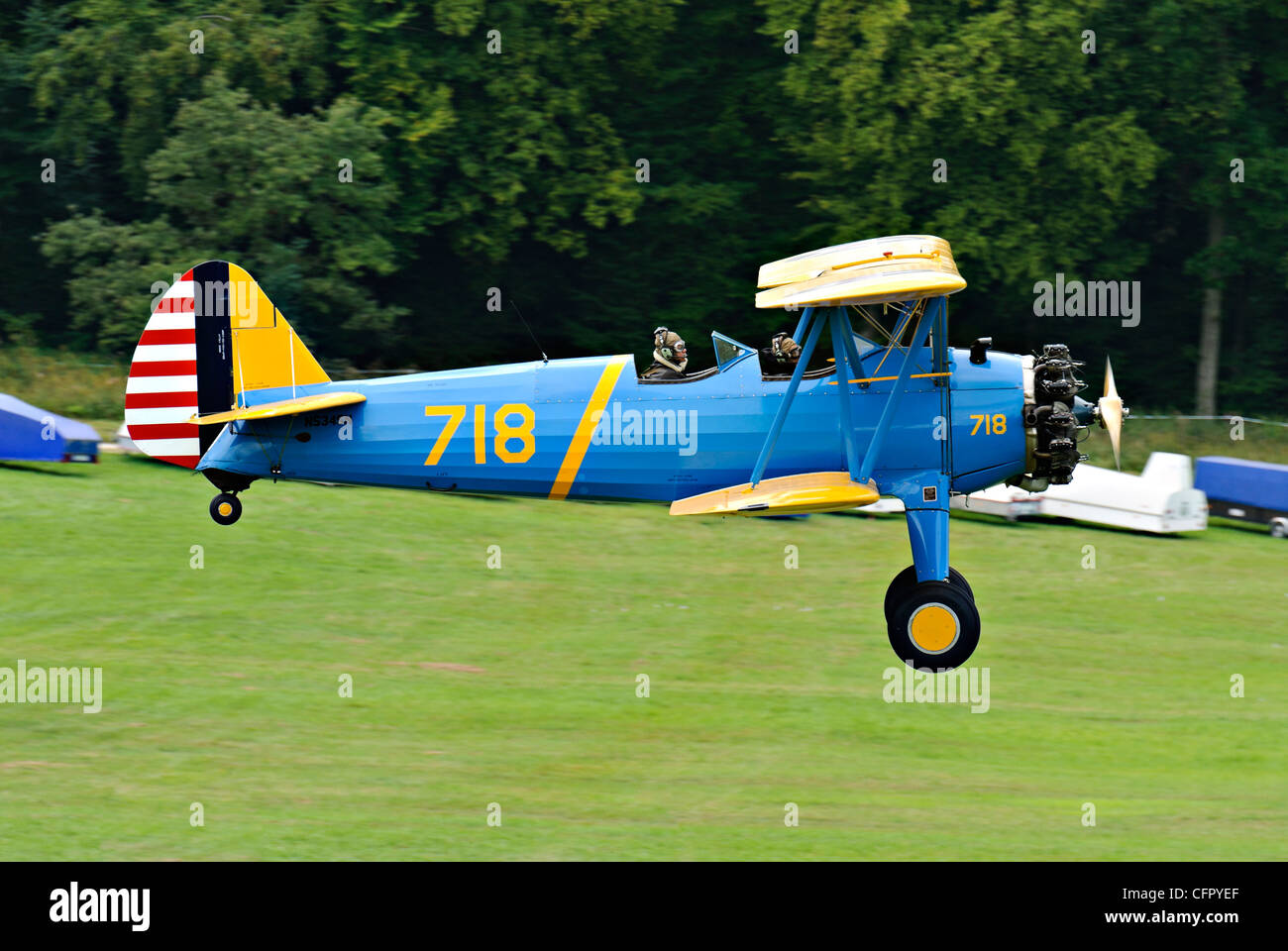 Boeing-Stearman PT-17 biplane landing at the Hahnweide vintage air show, Kirchheim-Teck, Germany  CFPYEF Stock Photo