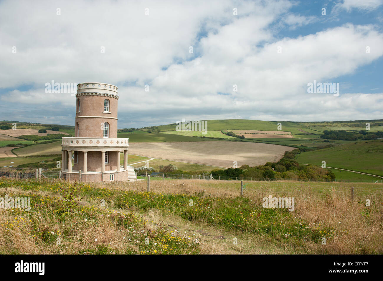 Clavell Tower on Hen Cliff in Kimmeridge bay, Dorset, which was called the Black Tower in the P.D. James novel of the same name Stock Photo