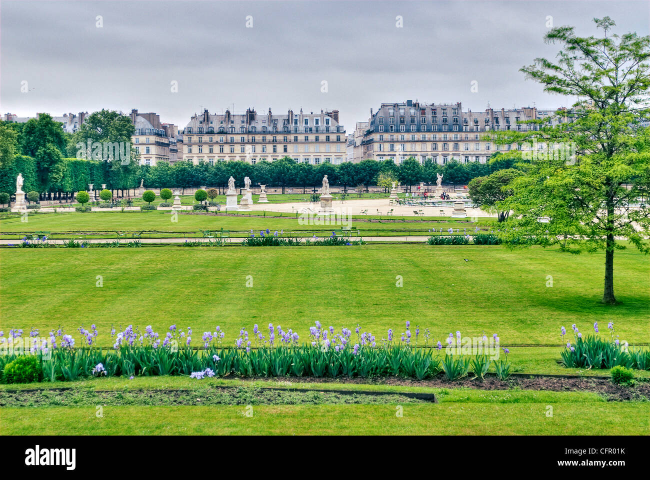 The Jardin des Tuileries, located between the Louvre and Place de la Concorde, is one of Paris's most visited gardens. Stock Photo