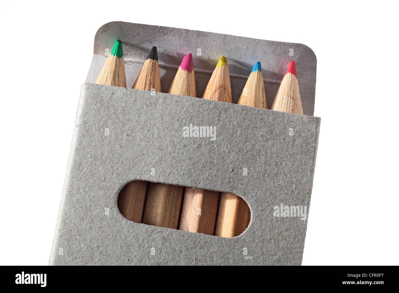 wooden color pencils in a gray carton box isolated in white Stock Photo