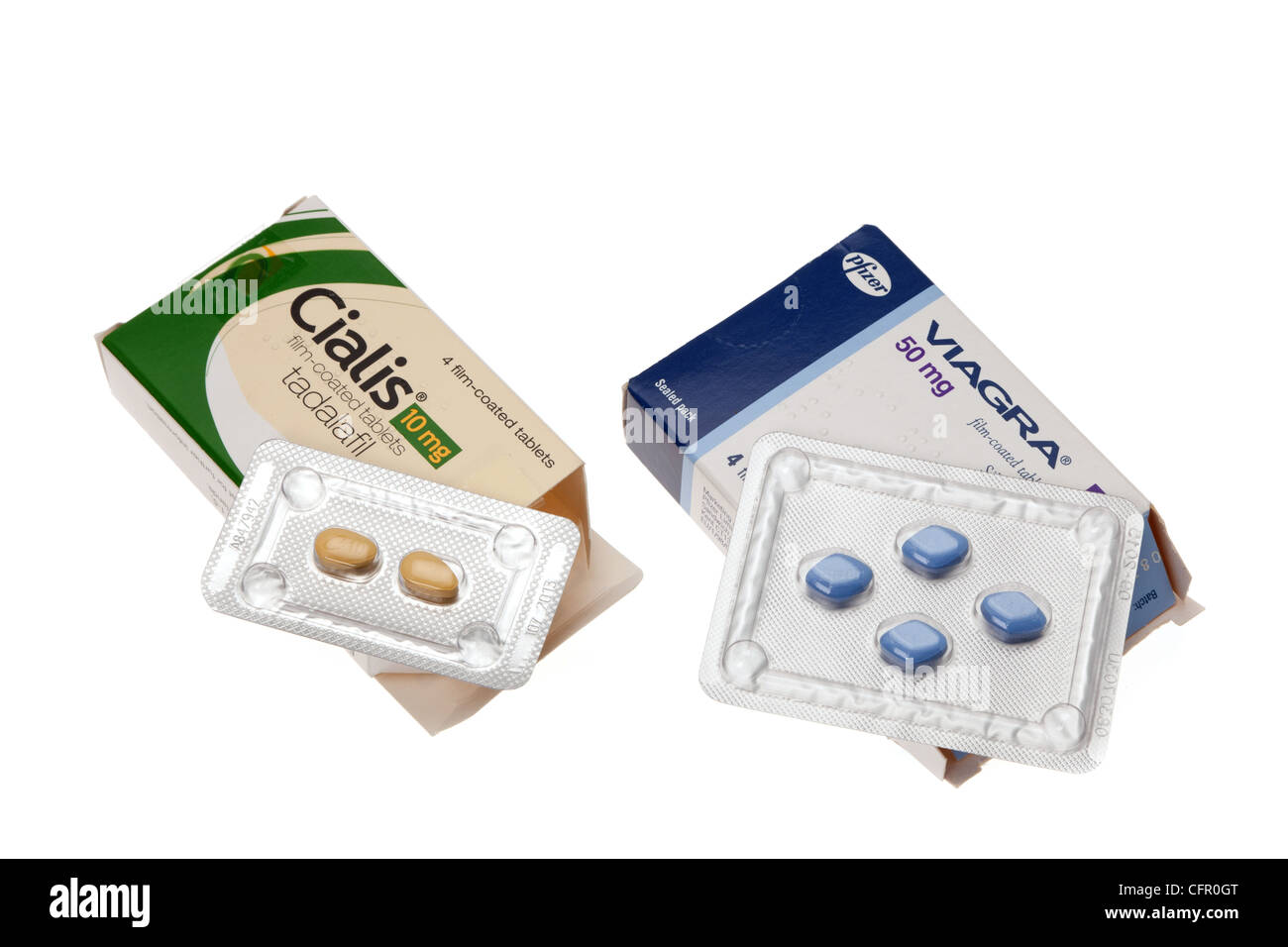 Close up on the prescription tablets Viagra and Cialis - both medications are used to treat men with an erectile dysfunction. Stock Photo