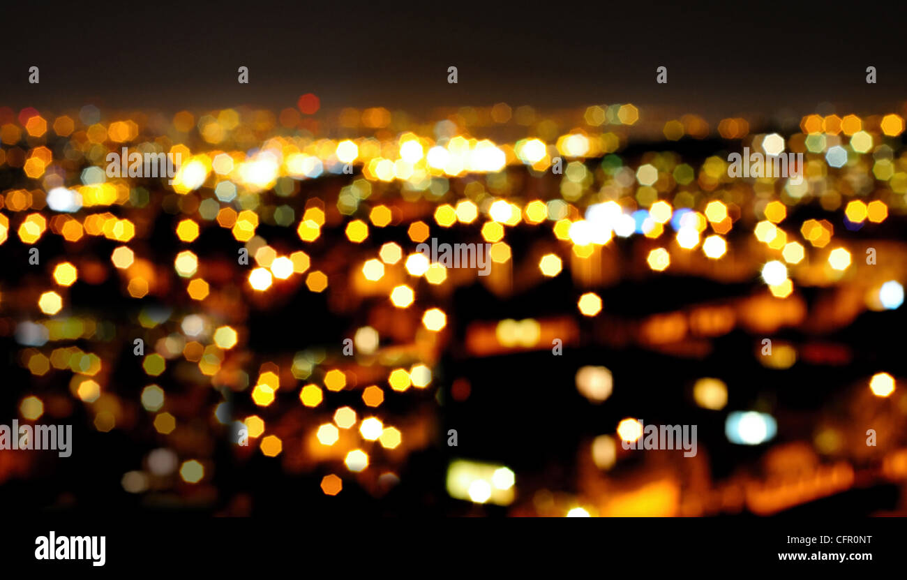 Orange bokeh from the lights of the night city. Stock Photo