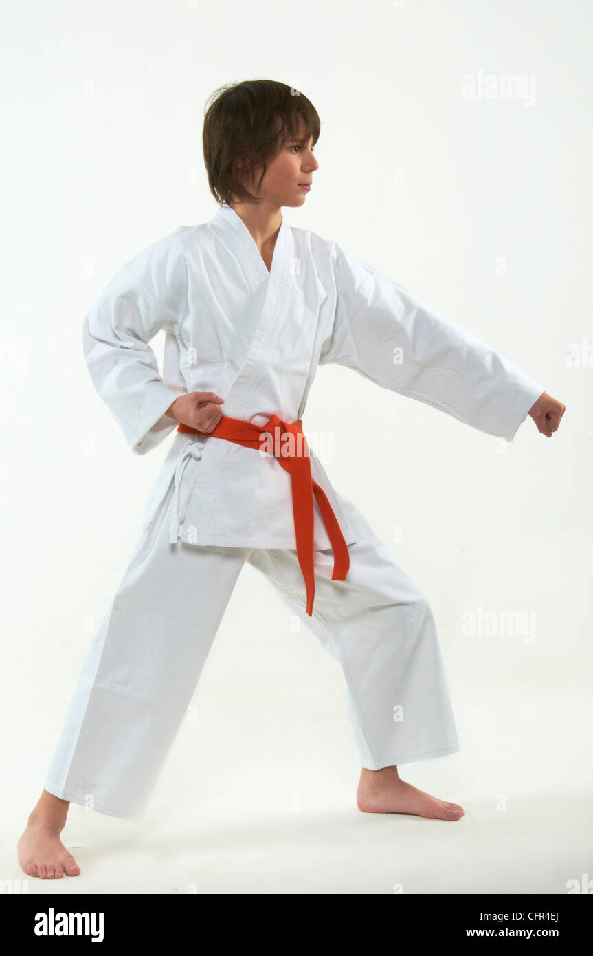 boy practicing karate on white background Stock Photo Alamy