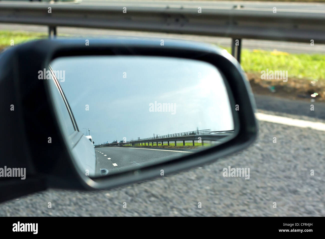 Offside mirror on a fast moving car Stock Photo Alamy Offside mirror on a fast moving car Stock Photo Alamy