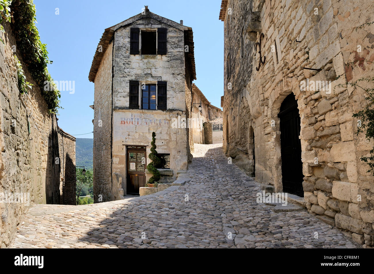 Cobbled alley in the picturesque medieval village of Lacoste, Provence, France, Europe Stock Photo