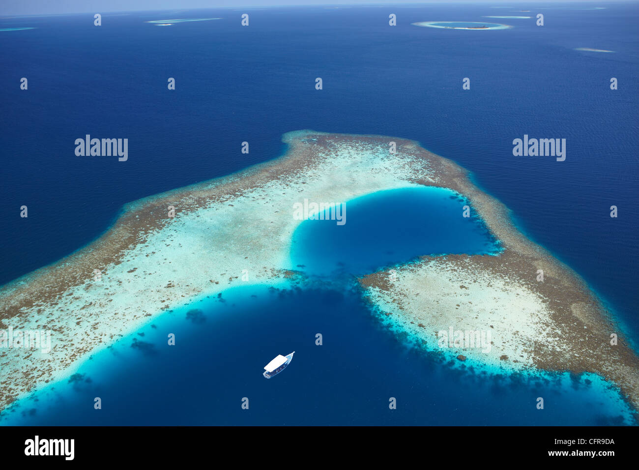 Aerial view of coral reef and islands, Maldives, Indian Ocean, Asia Stock Photo