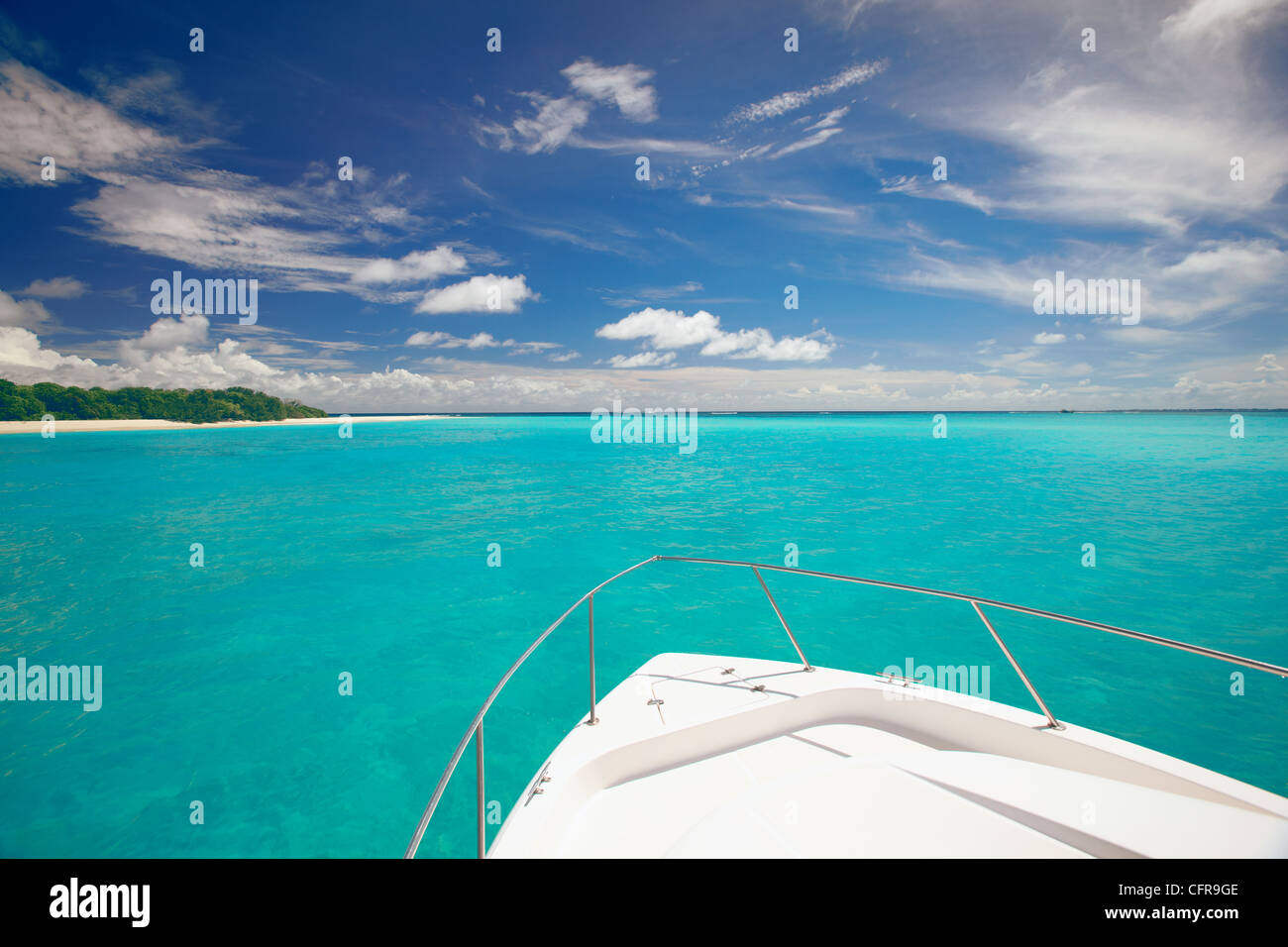 Speedboat arriving in Tropical beach, Maldives, Indian Ocean, Asia Stock Photo