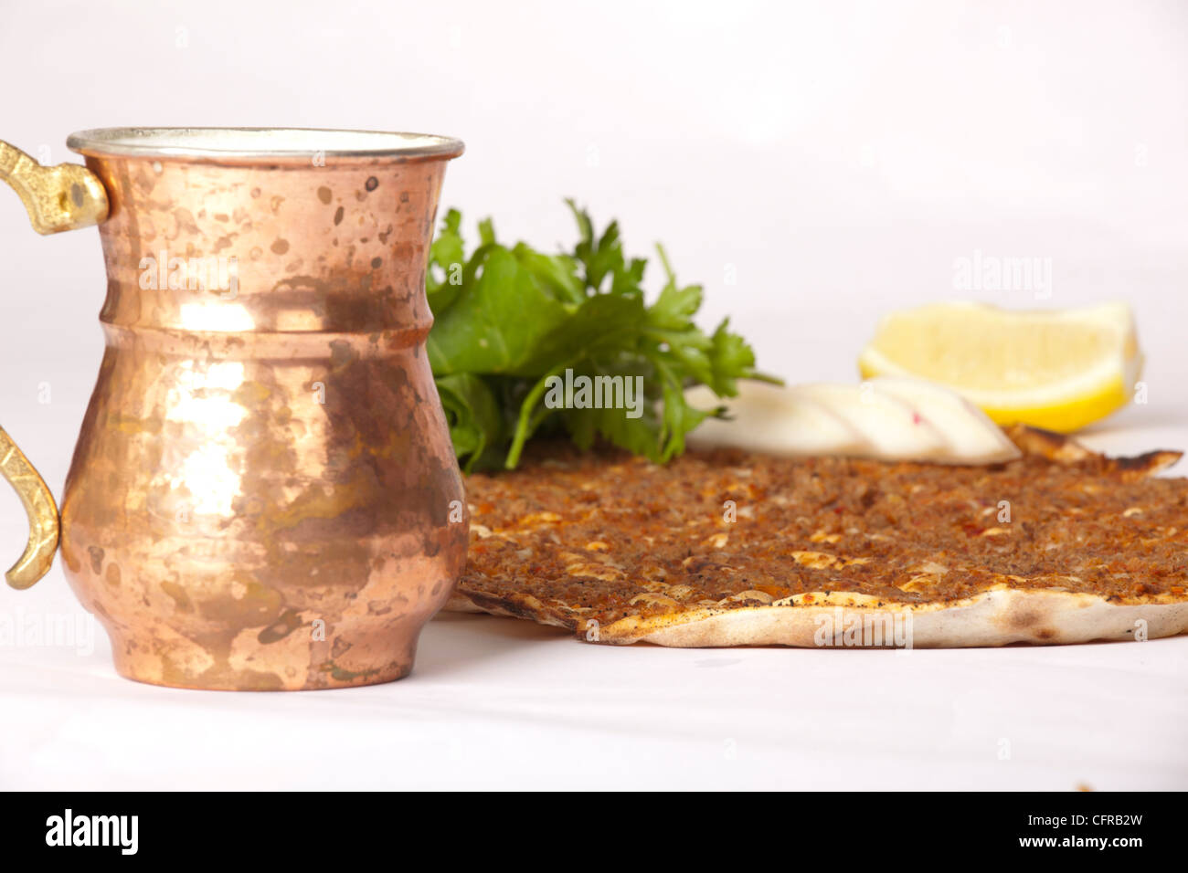 Delicious Turkish pizza lahmacun on isolated background Stock Photo