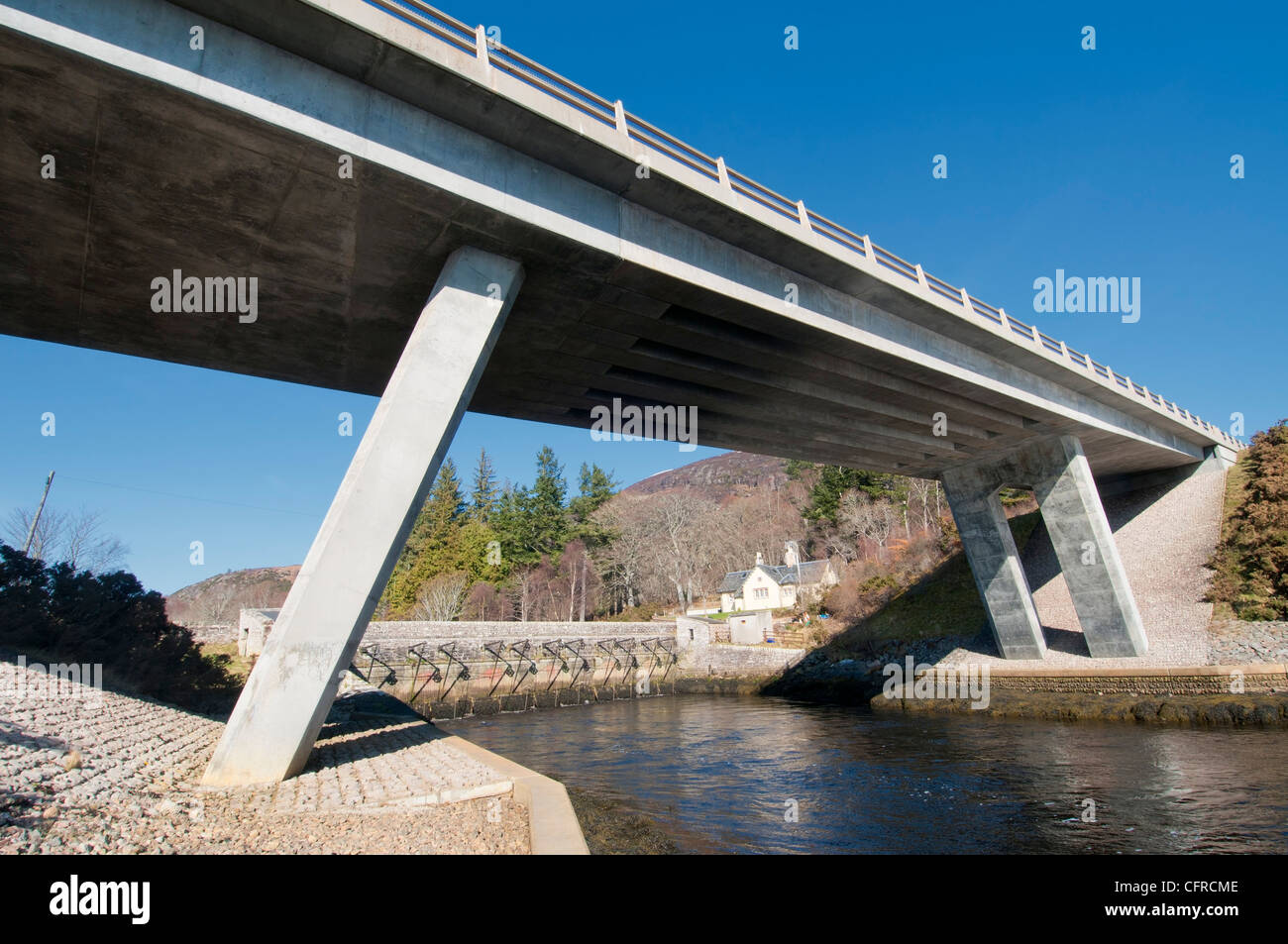 A modern road bridge on the A9 over the River Fleet at The Mound, north of Inverness, Scotland. Stock Photo